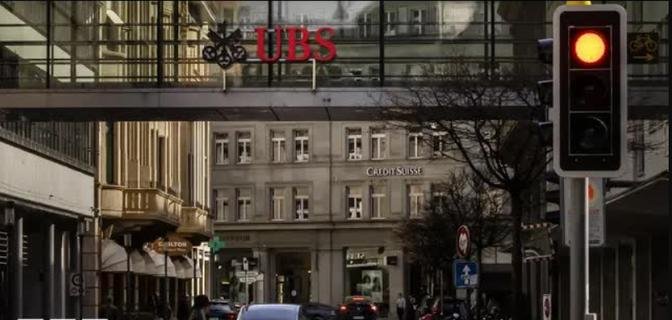 Swiss bank UBS in talks to take over troubled rival Credit Suisse 