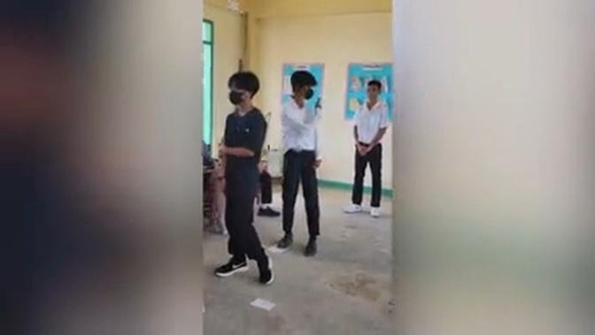 Students fail hilariously at ‘pass the dance step’ Christmas party game