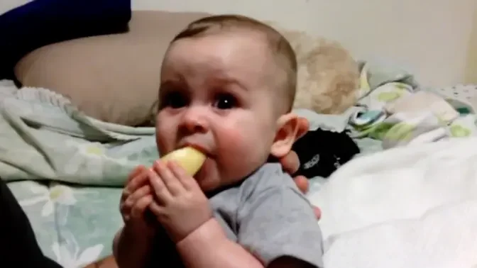 Cute Baby Eats Lemon for First Time 