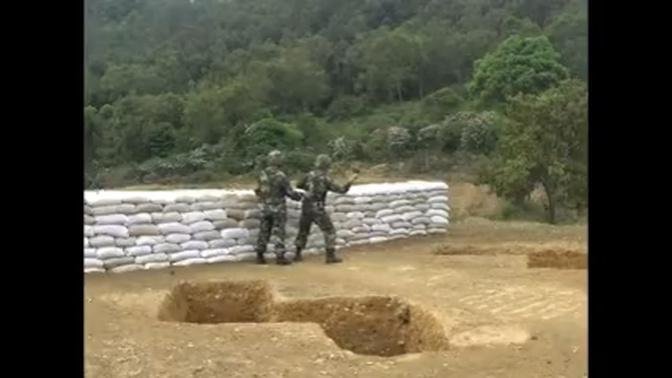 Rookie Chinese soldier escapes grenade-throwing fail