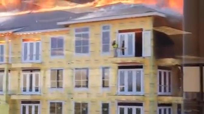 Incredible video shows construction worker's dramatic rescue from burning Houston building