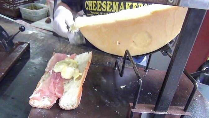 New York Street Food. Yummy Swiss Raclette. Ham, Hot Dog, Sausage with Soft Warm Cheese