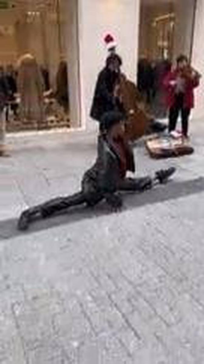 Dancer produces stunning routine after being challenged to dance with buskers in Madrid