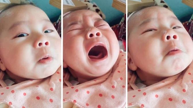 Baby pretends to cry to get parents' attention
